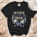 Black t-shirt with "MOTHER of the BRIDE" text and floral design.
