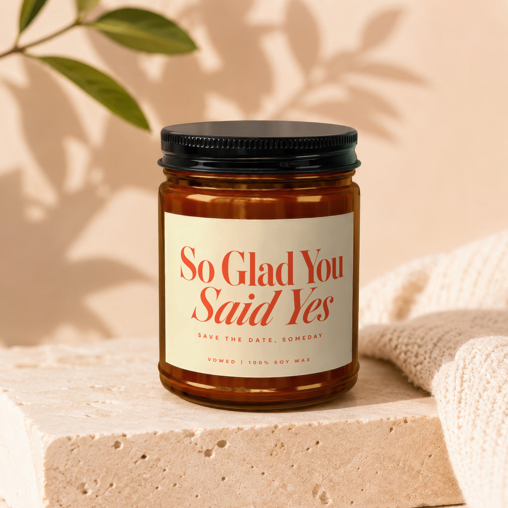 Candle with "So Glad You Said Yes" text, 100% soy wax.