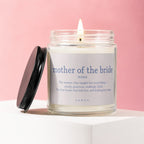 Candle labeled "mother of the bride noun" with a loving definition.