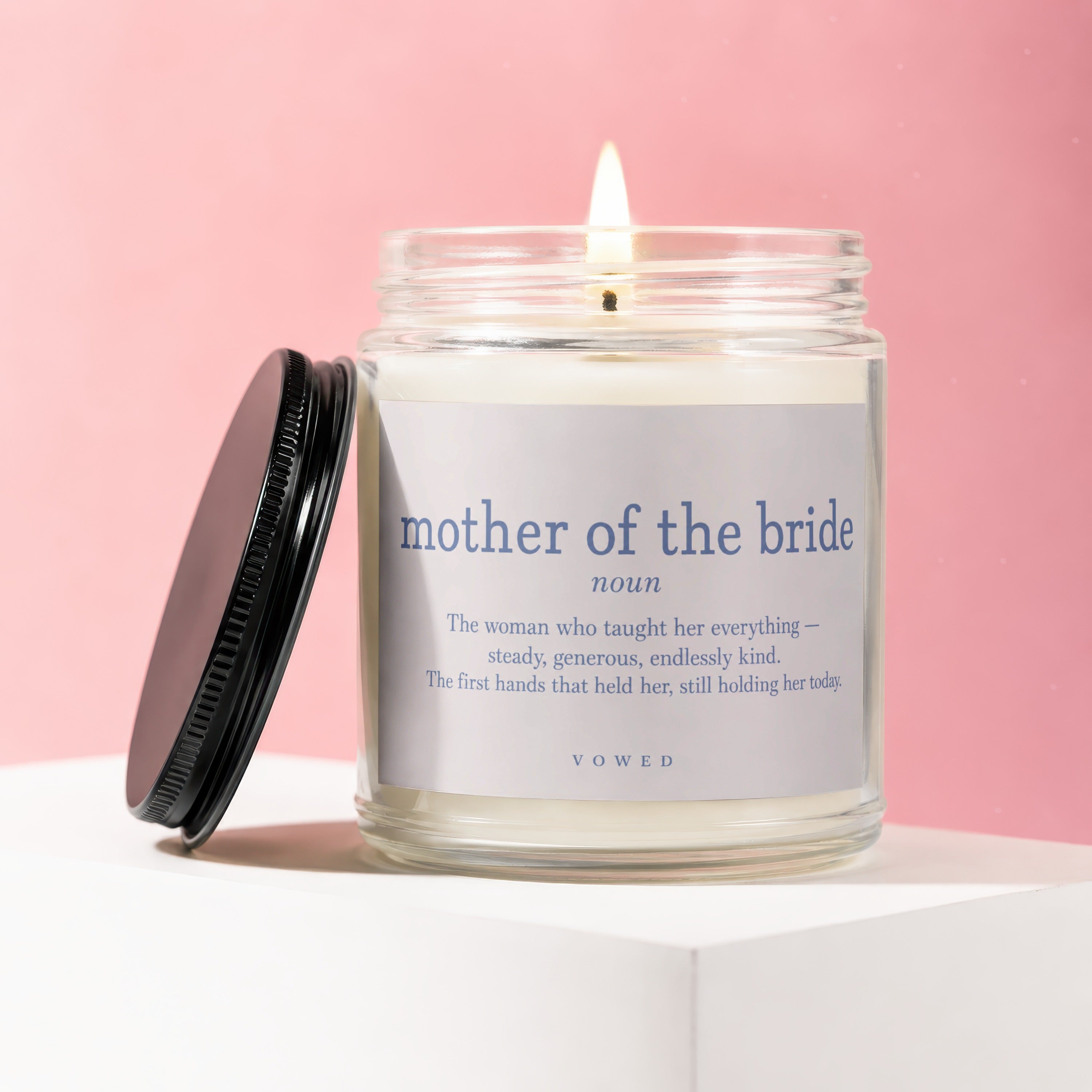 Candle labeled "mother of the bride noun" with a loving definition.