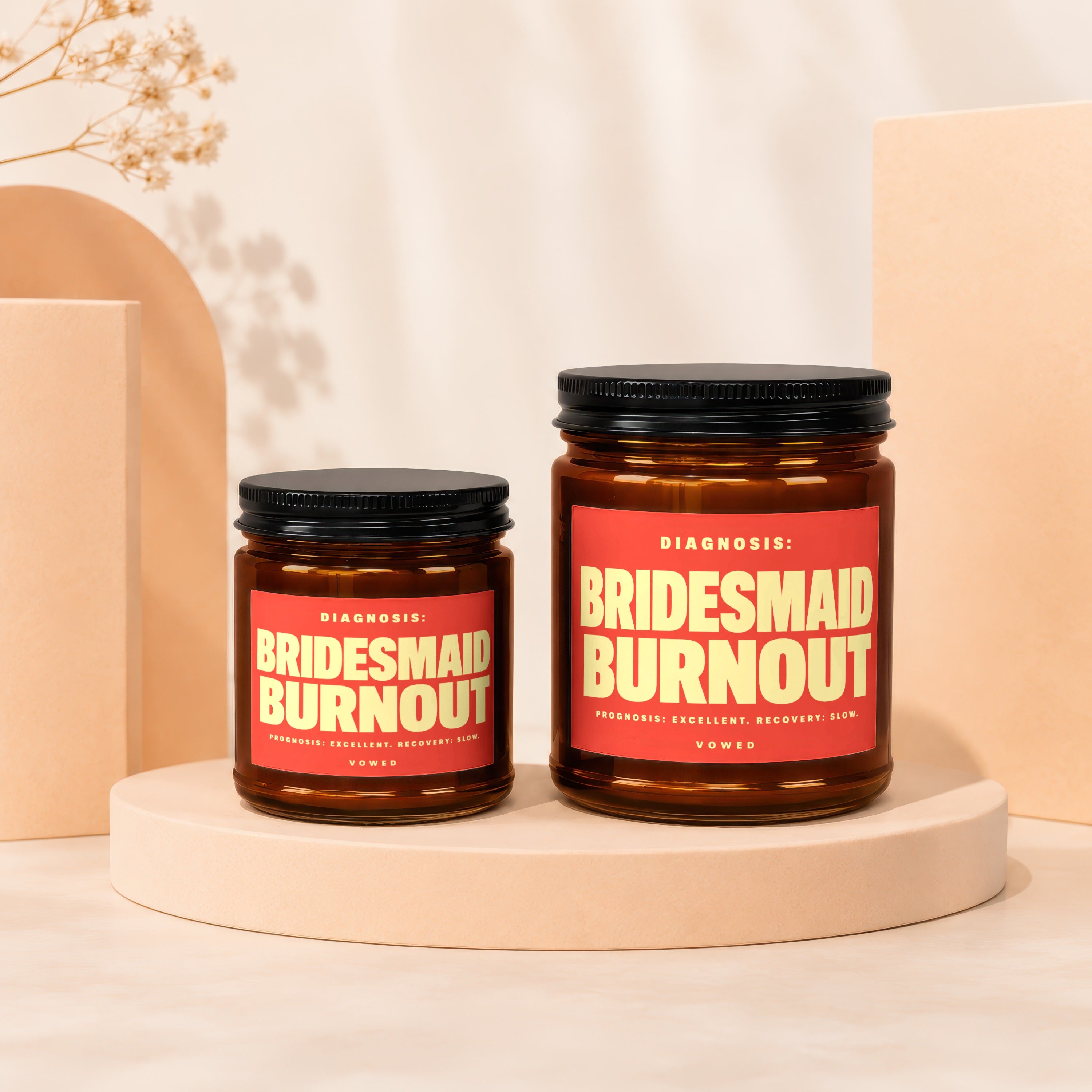 Two amber jars with black lids, labeled "Bridesmaid Burnout."