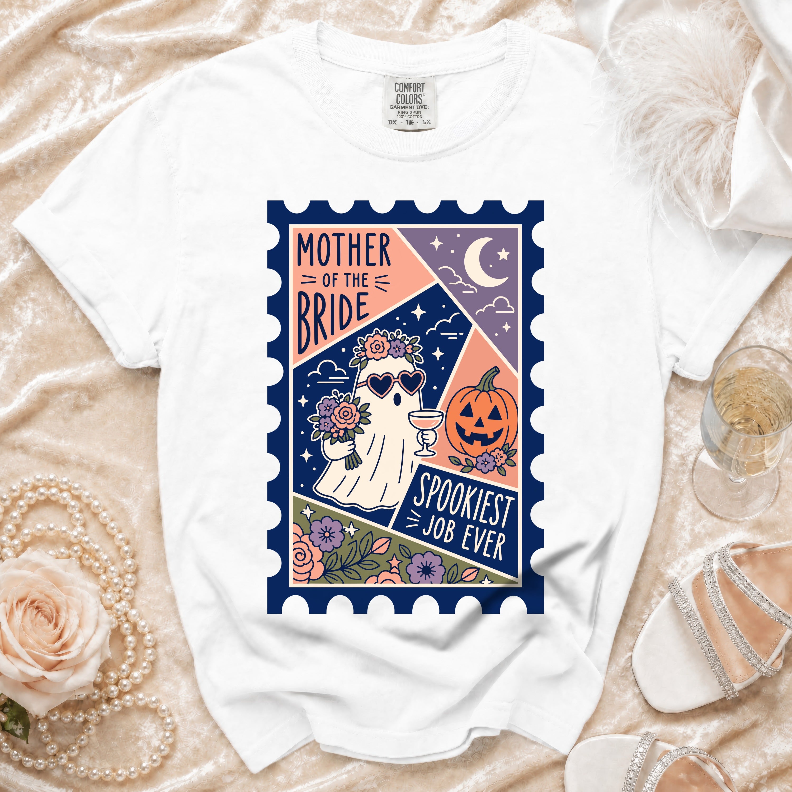 White t-shirt with "Mother of the Bride" and ghost graphic within a stamp.