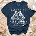 Navy t-shirt with white text and graphics: "mother of <the bride> and also in charge of the candy".