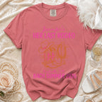 Coral t-shirt with "Jennifer's Her Last Rodeo" and cowboy boots graphic.