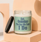 Glass candle with "Est. Someday The Day We Said I Do" text.