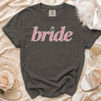 Gray t-shirt with pink polka dot "bride" text and diamond ring graphic.