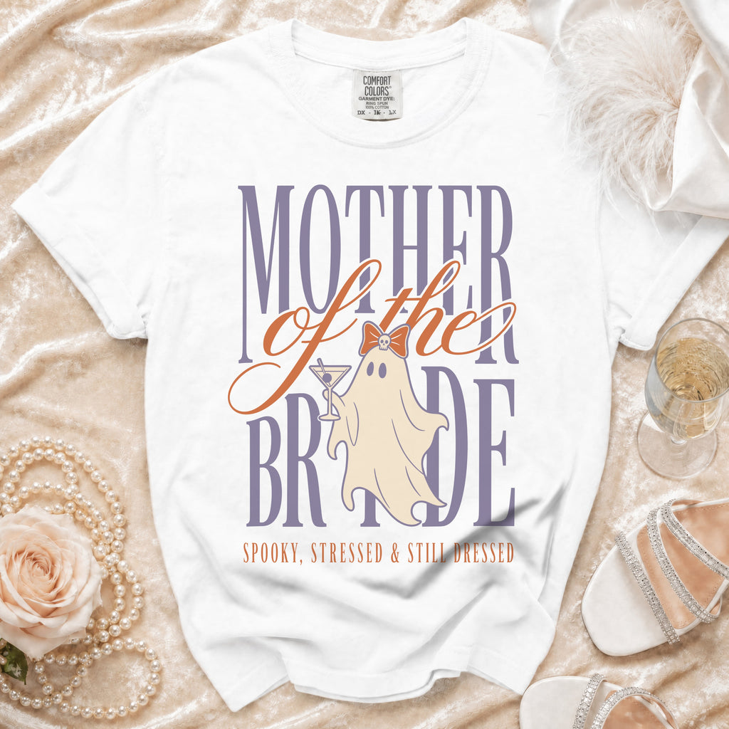 White t-shirt with "MOTHER of the BRIDE" text, a ghost, and "SPOOKY, STRESSED & STILL DRESSED".