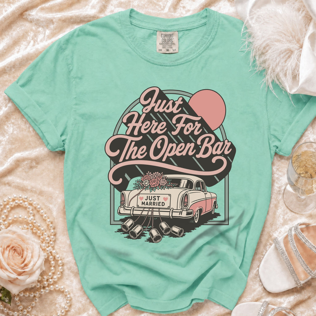 Mint green t-shirt with "Just Here For The Open Bar" graphic and a vintage car.