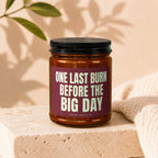 Candle with text "ONE LAST BURN BEFORE THE BIG DAY" on a stone block.