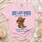 Pink t-shirt with "Her Last Rodeo" and cowboy boots graphic.