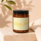 Amber jar candle with black lid, label reads "Smells Like Happy Tears"