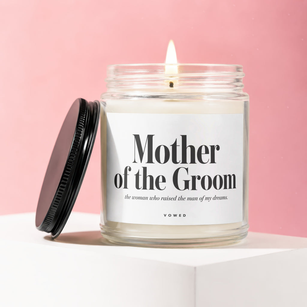 Candle labeled "Mother of the Groom" with text "the woman who raised the man of my dreams. VOWED".