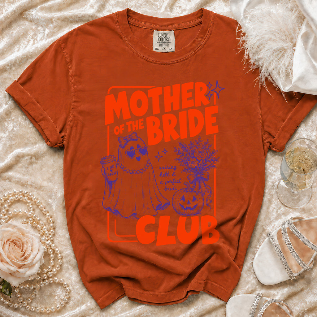 Orange t-shirt with "Mother of the Bride Club" graphic featuring a ghost and pumpkin.