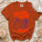 Orange t-shirt with "Mother of the Bride Club" graphic featuring a ghost and pumpkin.