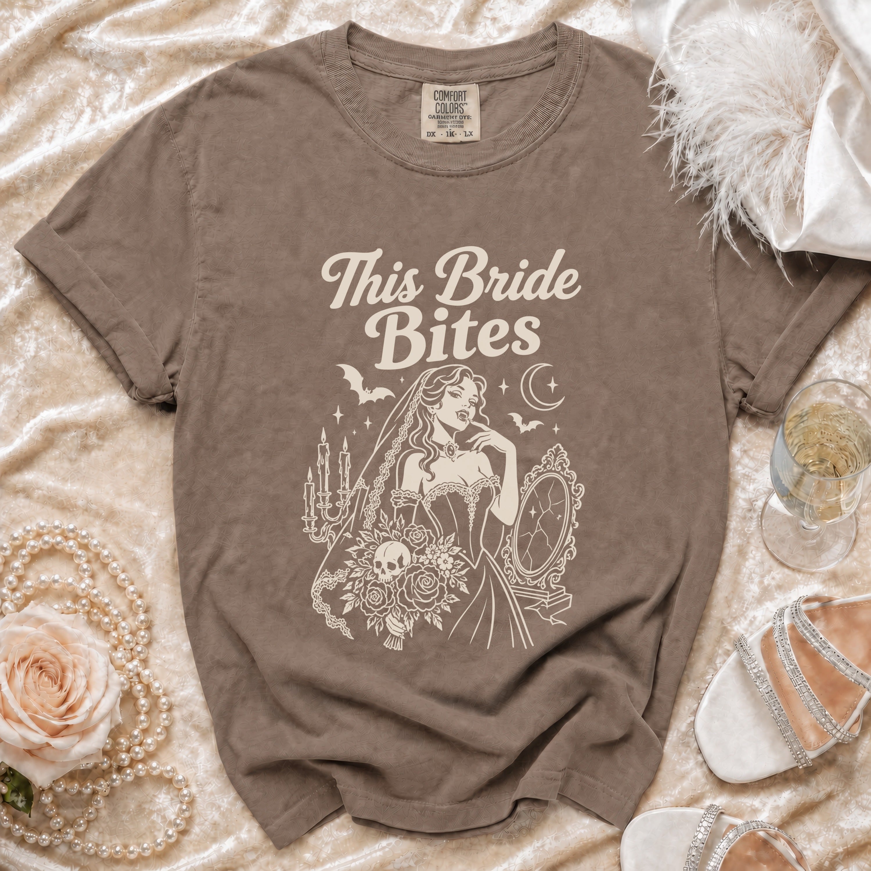 Brown t-shirt with "This Bride Bites" text and a vampire bride graphic.