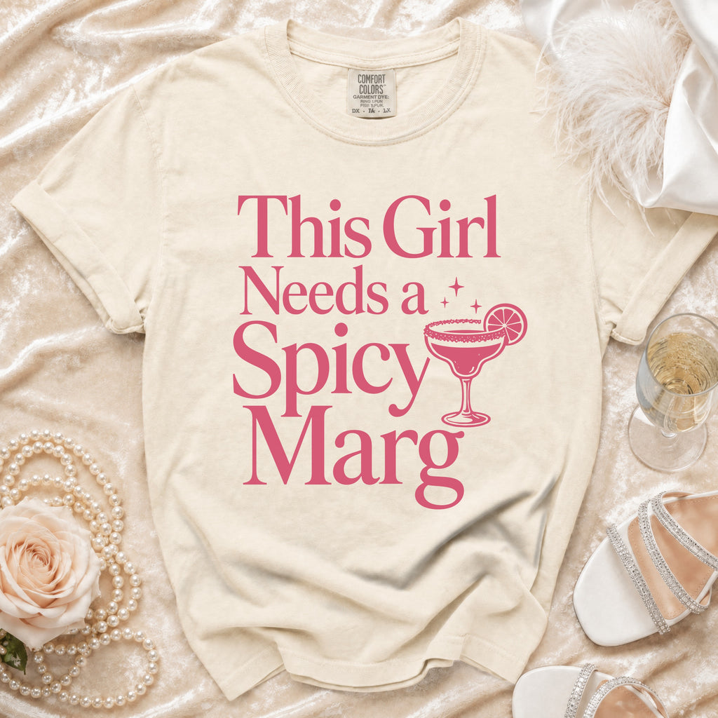 T-shirt with "This Girl Needs a Spicy Marg" text and margarita graphic.