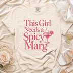 T-shirt with "This Girl Needs a Spicy Marg" text and margarita graphic.