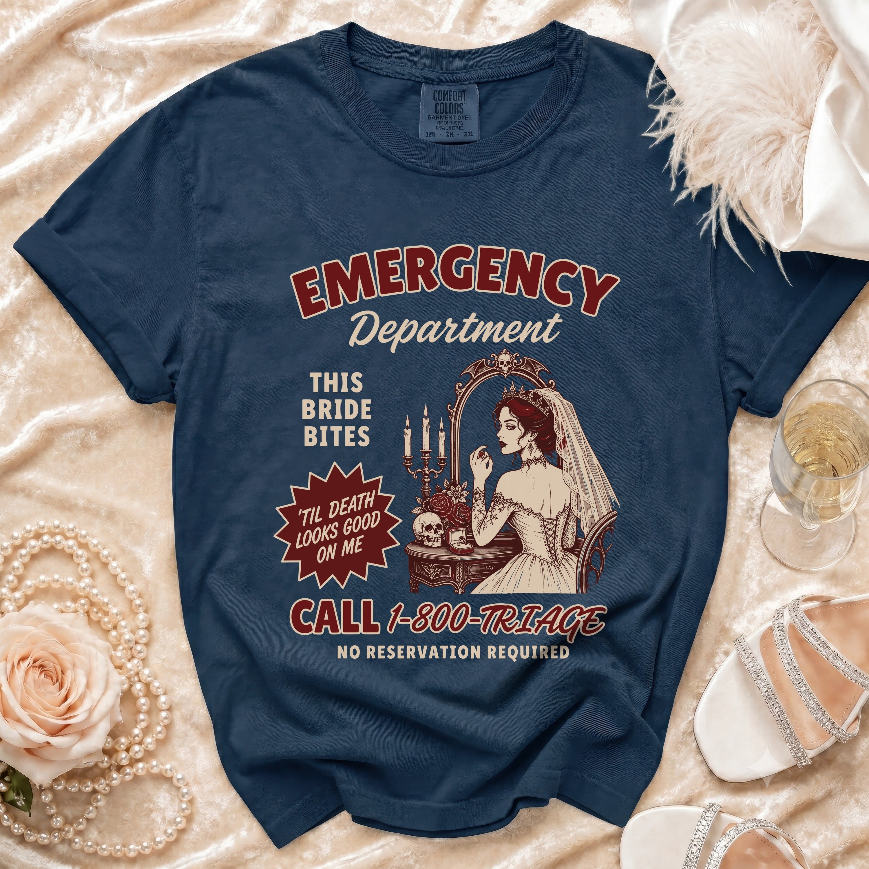 Navy t-shirt with "Emergency Department" and vampire bride graphic.