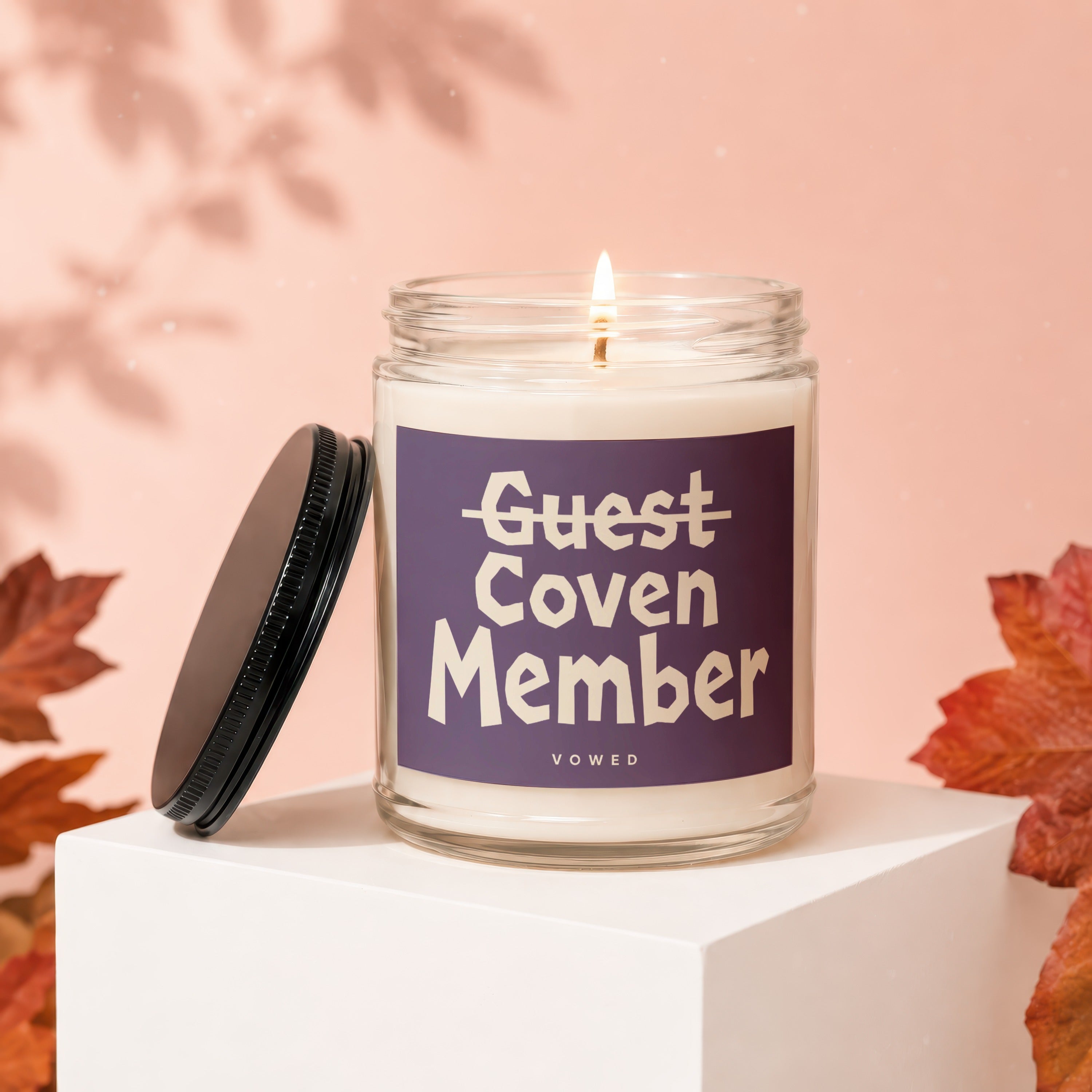 Candle with "Guest Coven Member" text and "vowed" below.