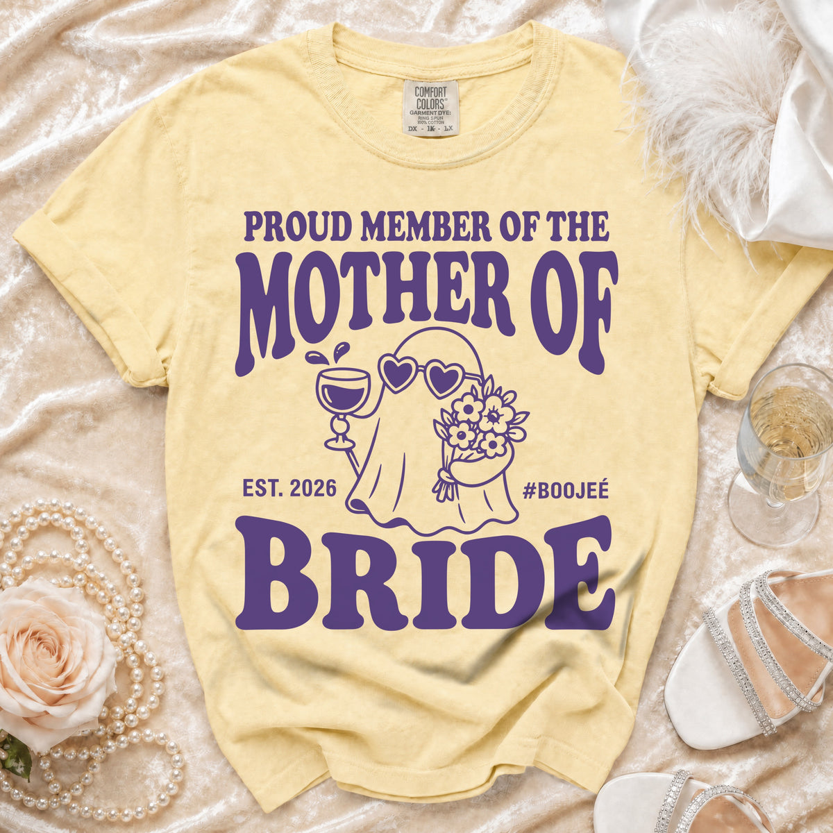 Yellow t-shirt with purple text "Proud Member of the Mother of Bride Est. 2026 #Boojee".