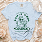 Light blue t-shirt with green skeleton bride graphic and text.