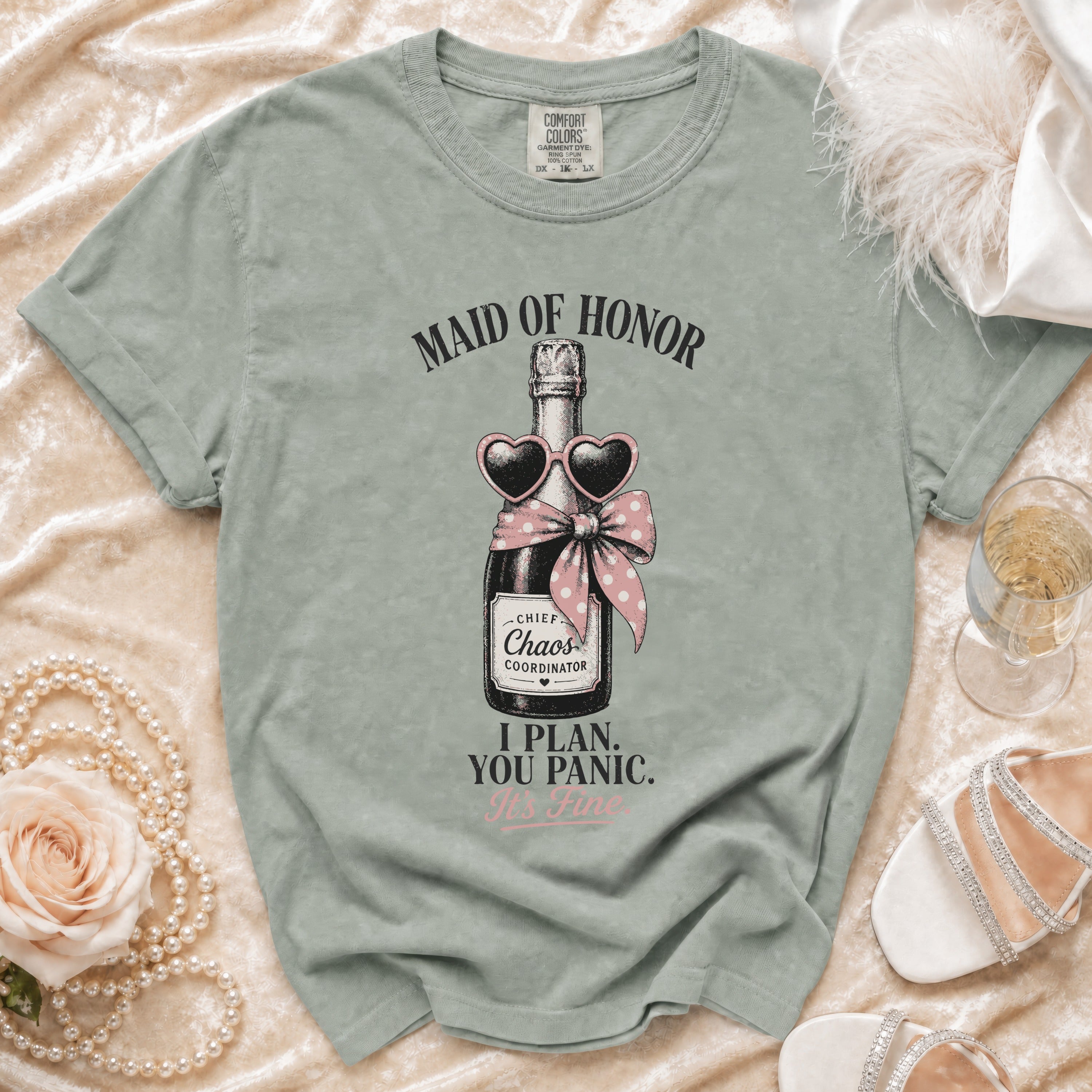 Maid of Honor t-shirt with champagne bottle, heart sunglasses, and text.