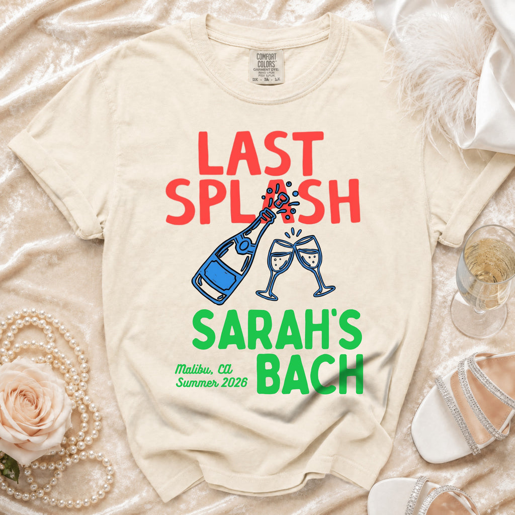 Cream t-shirt with "Last Splash Sarah's Bach Malibu, Ca Summer 2026" text and champagne glasses.