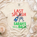 Cream t-shirt with "Last Splash Sarah's Bach Malibu, Ca Summer 2026" text and champagne glasses.
