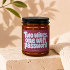 Jar with black lid, red label reading "Two wives, one wifi password".
