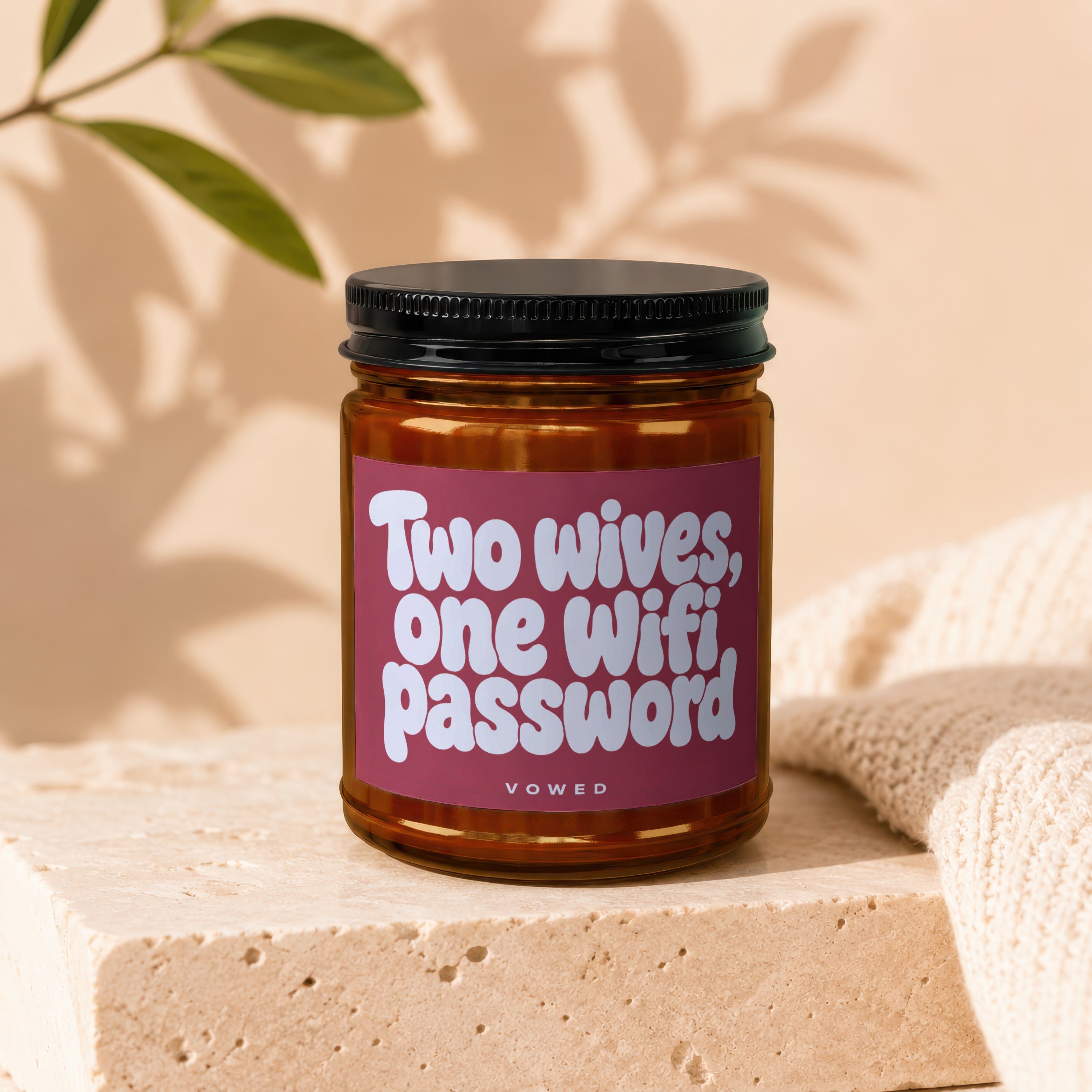 Jar with black lid, red label reading "Two wives, one wifi password".