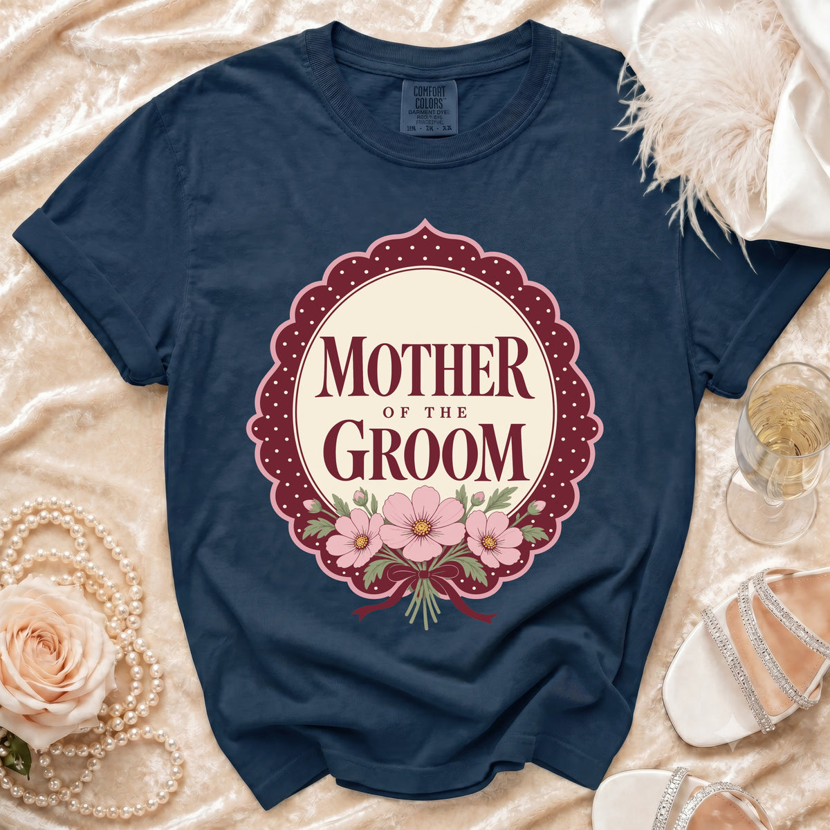 Navy blue t-shirt with "Mother of the Groom" text and floral design.