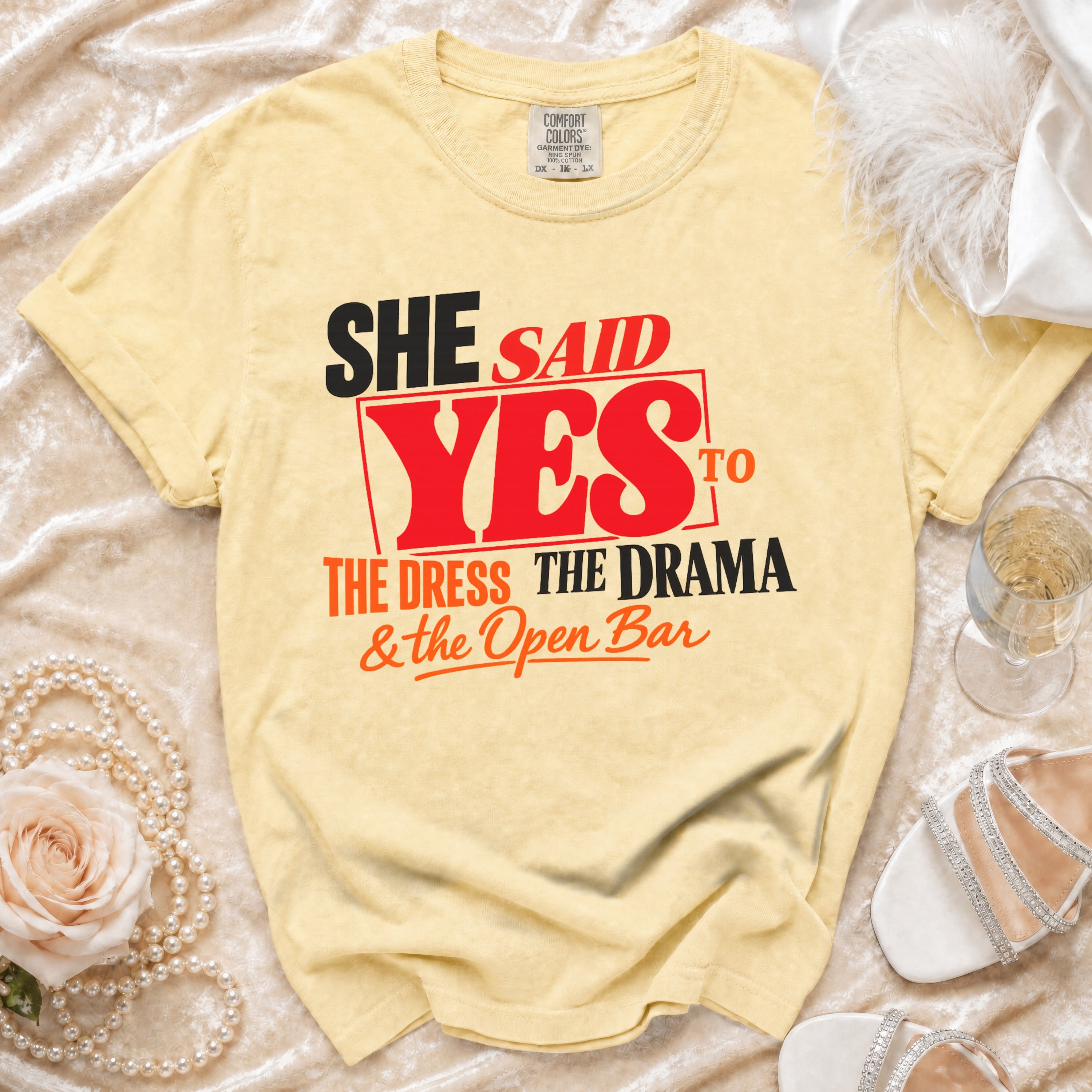 Yellow t-shirt with "She Said Yes To The Dress The Drama & the Open Bar" text.