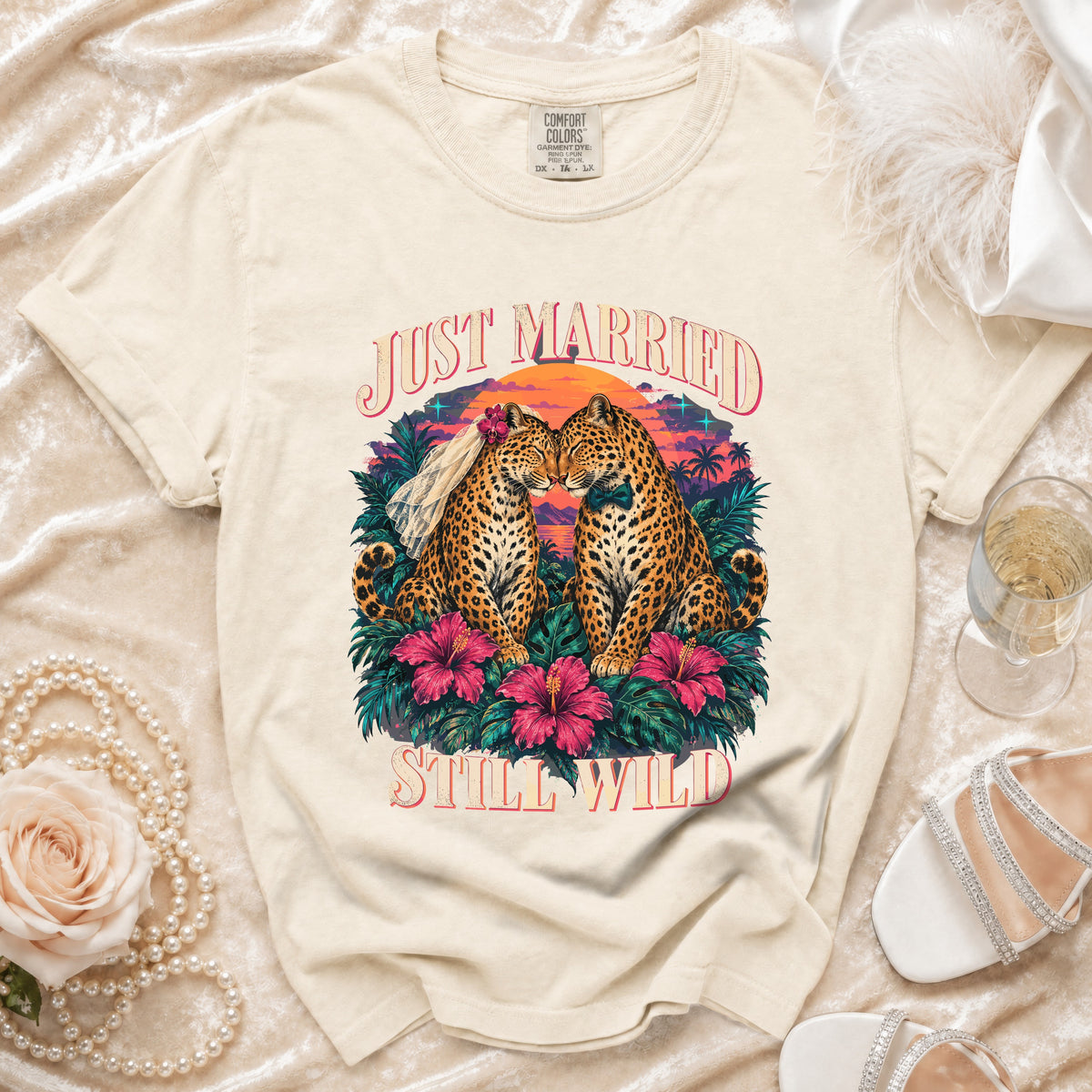 Cream t-shirt with "Just Married Still Wild" text and two leopards kissing.