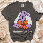 Dark grey t-shirt with purple witch hat graphic and "Mother of the Boo" text.