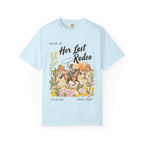 Light blue t-shirt with "Her Last Rodeo" and desert scene graphic.