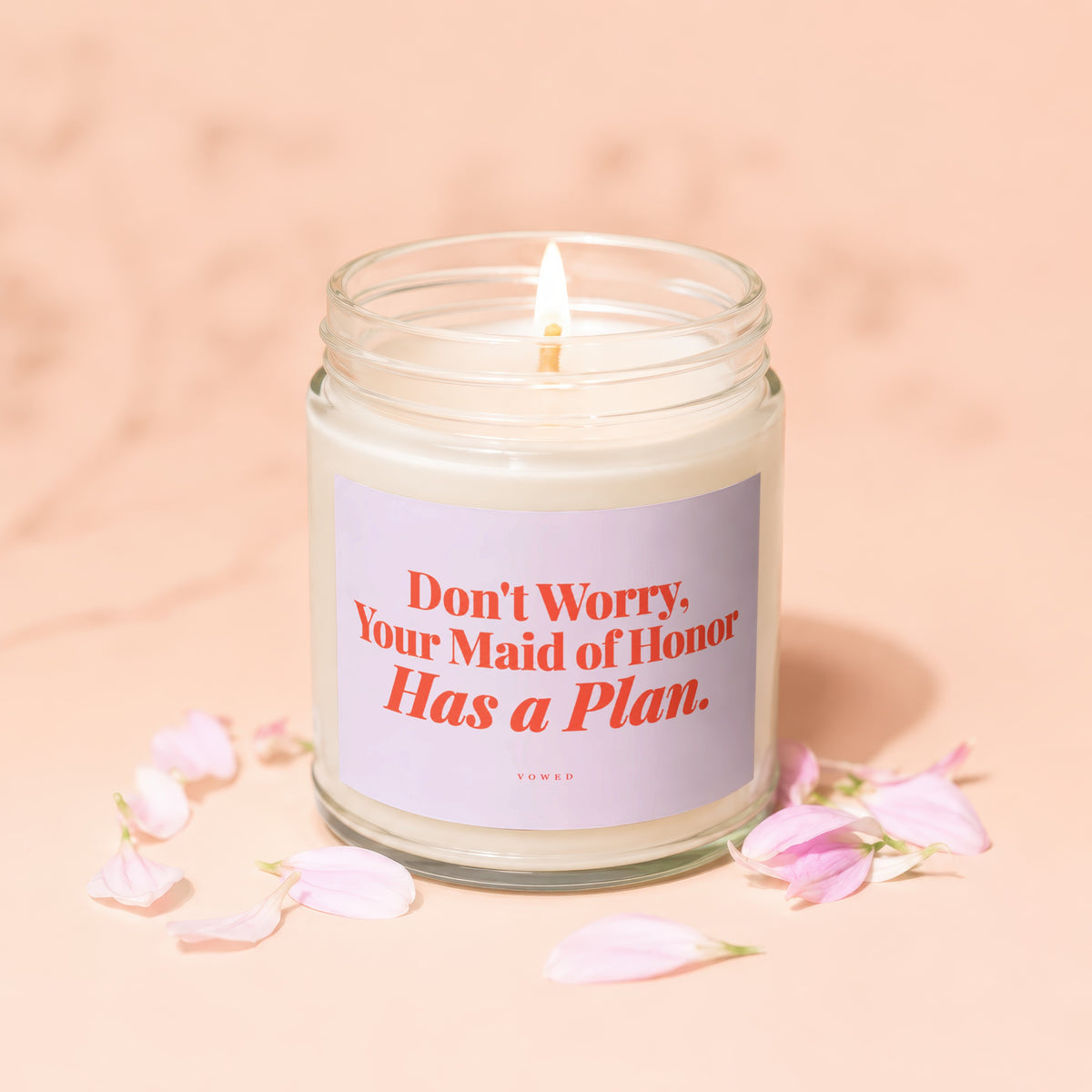 Lit candle in a jar with "Don't Worry, Your Maid of Honor Has a Plan" text.