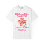 White t-shirt with "Her Last Rodeo Jennifer's Bach" text and pink cowboy hat.