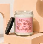 Candle with pink label reading "From boyfriends to husbands" and "VOWED."