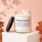 Candle labeled "Mother-in-Love: with descriptive text and VOWED. Lid is ajar."