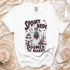 White t-shirt with "Spooky Bride 'Til Death Do Us Party Doomed To Marry" graphic.