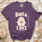 Purple t-shirt with ghost bride graphic saying "Boos & I Do's Social Club".