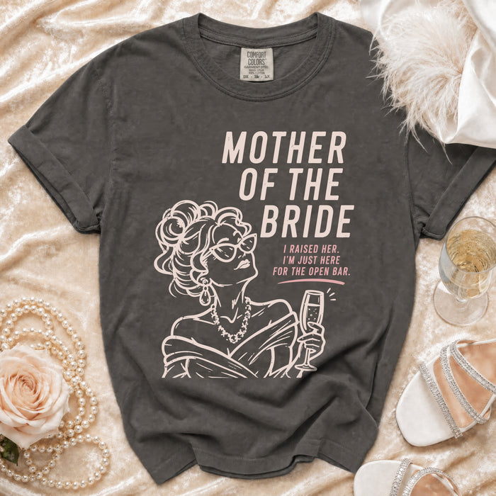 Dark grey t-shirt with "Mother of the Bride" graphic and text.