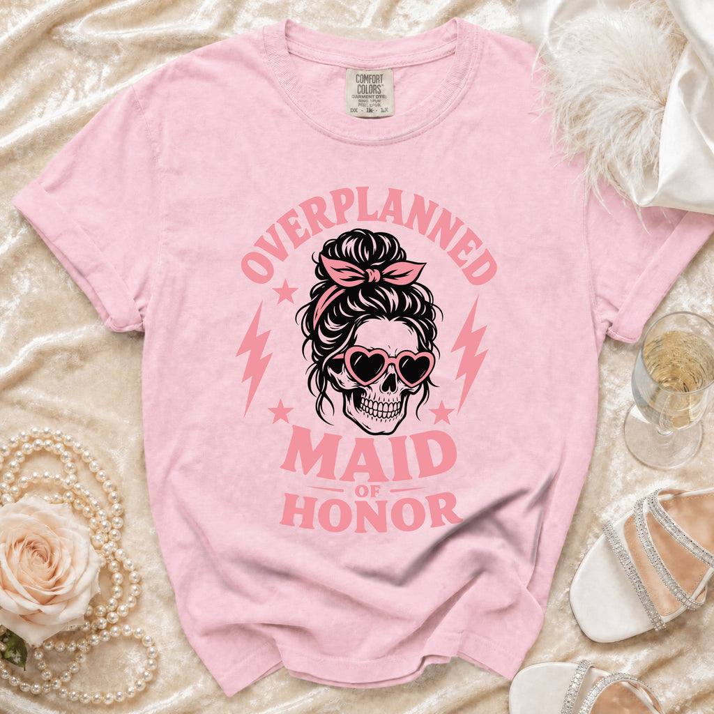 Pink t-shirt with "Overplanned Maid of Honor" text and skull graphic.
