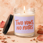 Candle with "Two vows, no notes. VOWED" text on a lavender label.