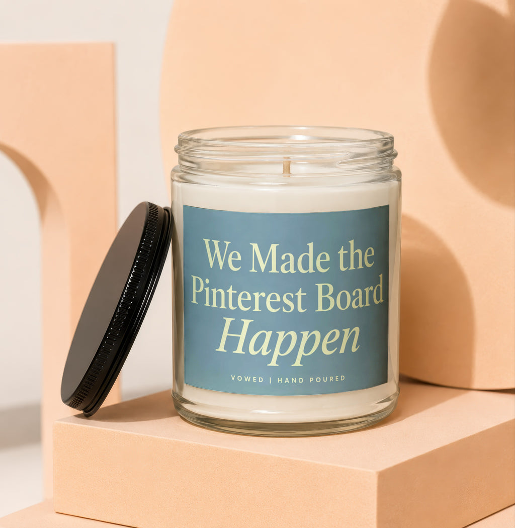 Glass candle with label reading "We Made the Pinterest Board Happen".