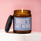 Amber jar candle with lit flame and black lid, reads "BRIDE'S LAST NERVE".