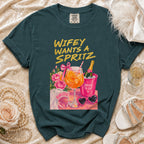 Teal t-shirt with "Wifey Wants a Spritz" graphic, cocktail, and bridal accessories.