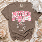 Brown t-shirt with pink text "MOTHER OF THE BRIDE to be" and a ghost graphic.