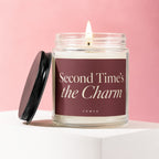 Candle with burgundy label reading "Second Time's the Charm" by Vowed.