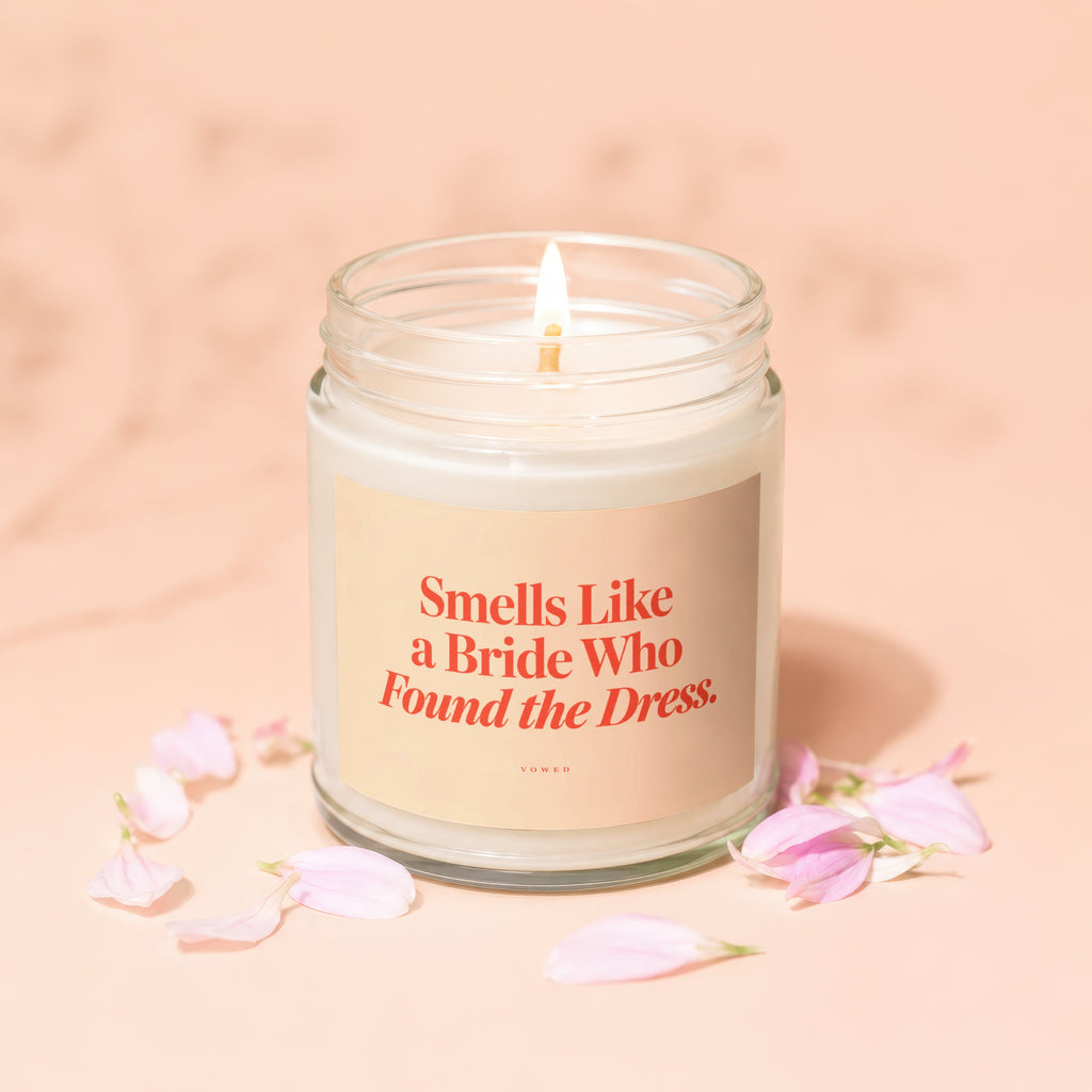 Candle with text "Smells Like a Bride Who Found the Dress."